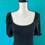 Pink Lily  black puff sleeve bodysuit in size small Photo 1