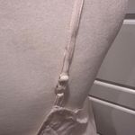 Mimi White Sleeveless V Photo 4