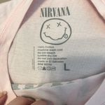 Nirvana  size large fits like a medium light pink short sleeve band T-shirt EUC Photo 3