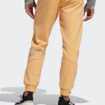 Adidas  Adult Unisex Go Retro Peloton Jogger Size Large Orange Photo 3