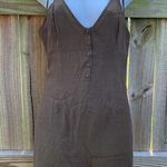 Wild Honey olive green button front spaghetti strap romper Photo 0