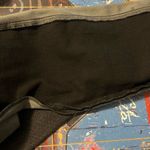 Universal Threads Classic Black Women's Jeans in front / black faux leather in back 10R 30”waist Photo 8