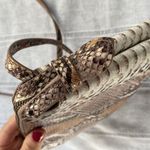 A New Day snakeskin print crossbody bag. Photo 6