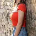 Victoria and Sophia  Orange Top Photo 2