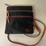 Dooney & Bourke  North/South Triple Zip Preppy Modest Nylon Crossbody Bag… Photo 0