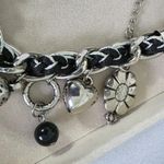 Silver and Black Charm Necklace Mixed Media Photo 4