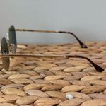 Revolve Aire Sunglasses  Photo 1