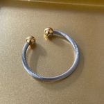 Silver Tone Twisted Bangle Bracelet w/ Gold Tone Ball Detail Photo 1