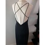 Forever 21 black maxi dress size small cut out front and cut out at the bottom Photo 2