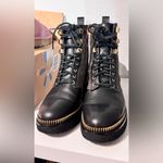 Michael Kors Black and Brown Combat Boots with Gold Details Photo 1