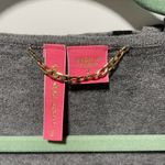 Black and Gray Ruffled V Photo 1