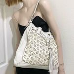 Brighton Perforated Daisy Drawstring Tassel Leather White Shoulder Hobo Bag Photo 0