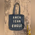 American Eagle Denim Faded Tote Bag with White Shirt Photo 4