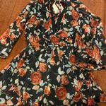 Band of Gypsies Flare Sleeve Floral Romper Photo 1