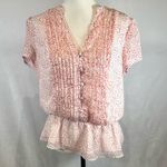 CeCe  red and white dot printed peplum top size large Photo 0