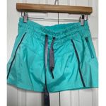 Lululemon  Run Revitalize Lined Tennis Skirt Skort Aqua Women's Size 4 Photo 1