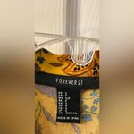 Forever 21 Women Yellow Floral Body
Suit Size Large with Tie At Neck Photo 2