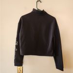 Adidas  black full zip cropped jacket size womens medium Photo 1