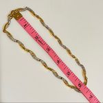 FO Fernando Original stamped vintage necklace sits at the base of neckline Gold Photo 4