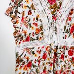 Torrid Babydoll Crinkle Gauze Crochet Inset Lace-up Top in White Floral Photo 4