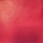 Kate Spade bright coral pink colored tote bag with snap closure and tassels Photo 4