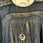 Gold Waterdrop Brushed Pendant on a Gold Rope Chain Photo 9