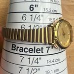 Timex Ladies Watch Vintage Gold-Tone Stainless Steel Stretch Band and Dial Photo 6