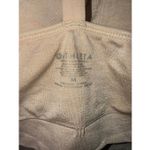 Athleta  beige sports bra padded medium adjustable straps racer back Photo 1