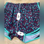 Nike Tempo Women’s Sz L Burgundy/Black/Teal Geo Pattern 3” Running Shorts Photo 10