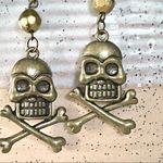Skull and crossbone earrings with bead on top Photo 1