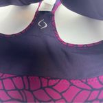 Moving Comfort  Switch it up Racer sports bra in Currant Woven size XS NWT Photo 2