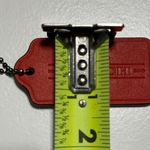 Coach Red Leather Hangtag 1941 with Carriage Stamped
FOB bag charm. Photo 6