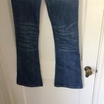 Women’s Medium Wash MidRise Slight Distress Babybell Jeans sz medium Blue Photo 6