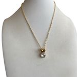 NWT SWAROVSKI CRYSTAL Gold Tone Bow Necklace Photo 1