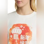 Golden Hour White Sweatshirt with Orange Graphic Size L Photo 1