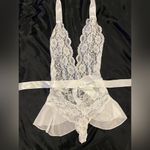 White lace lingerie with peplum skirt and bow sash Size M Photo 1