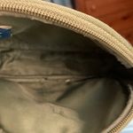 Disney  Mickey Mouse Cosmetic Bag. Green with Mickey Mouse printed all over. Photo 3