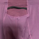 Mizuno  purple Womens running leggings with reflective zippers Photo 3