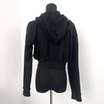 Forever 21 Black Zip-Up Hoodie in Size S Photo 2