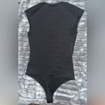Body Contour Black Bodysuit!
Body contour and stretchy material Size XS Photo 5