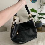 Black and Gold Shoulder Bag with Luxurious Texture Photo 1