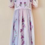 Ivy City Co Enchanted Purple Ruffle Embroidered Floral Puff Sleeve Tulle Dress. Photo 0