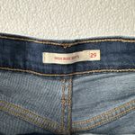 Levi's  High Rise Shorts Women's 29‎ Raw Hem Distressed Light Blue Wash Photo 6
