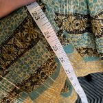 Free People long sleeve blouse in a shear material size medium. GUC. Photo 4