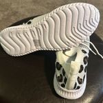 NWOT Step out in style with these chic white and black brown women's sneakers. Perfect for casual outings, these shoes offer both comfort and fashion. Size 10.5 never worn. Multiple Photo 2