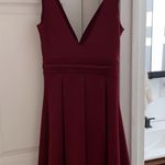 Boohoo  Maroon sleeveless mini dress with skater skirt and deep v neck Photo 4