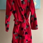 Cute puppies in leopard outfits fluffy robe Red Photo 0