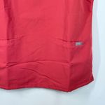 FIGS B5 ---  women’s COLOR CORAL PO 1646 scrub top size small **sleeve iron on Photo 2