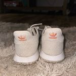 Adidas Women’s white  tennis shoes Photo 1