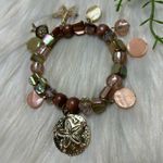 Sand dollar shore beaded stretchy bracelet Brown Photo 0